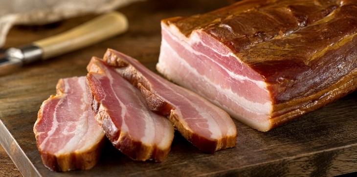 slab of pork on cutting board