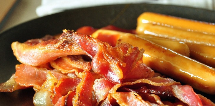 bacon and sausage in pan